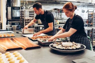 man and women cooking