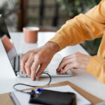 a guy connecting laptop to the dsl internet