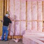 Fiberglass batt insulation installers